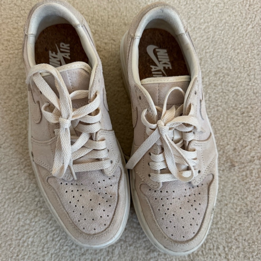 Nike Air Force 1 tan. Can very easily be cleaned. Cloth material